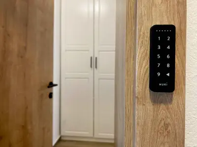 a close up of a door with a remote control at Soca Guesthouse in Kanal