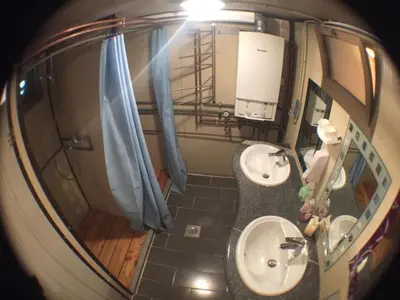a bathroom with a sink and a toilet and a mirror at Blazic I in Maribor