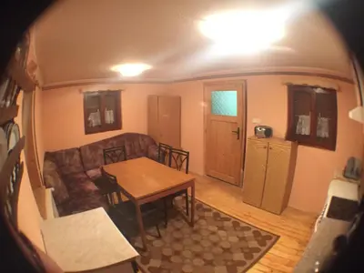 a living room with a couch and a table at Blazic I in Maribor