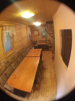 a view of a train room with wooden benches at Blazic I in Maribor