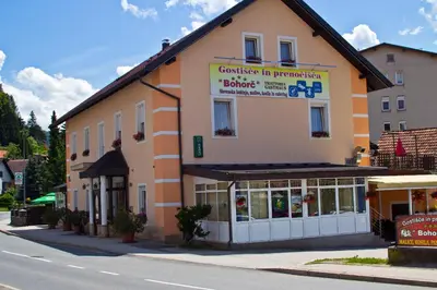 a building on the side of a street at Guest house Bohorč in Šentjur