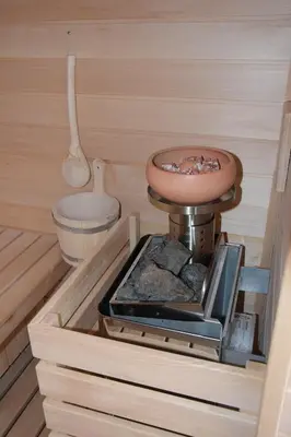 a kitchen with a bowl on top of a stove at Hiška sprostitve in Vransko
