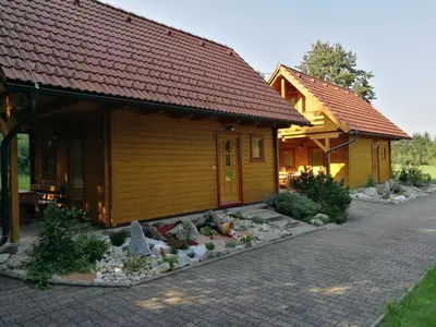 a house with a garden in front of it at Holiday House Jas-Mar in Radoslavci
