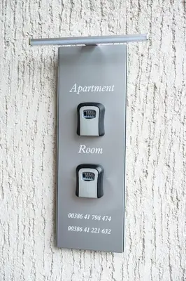 a sign on a wall that reads apartment room at Apartment Kanalec in Tolmin