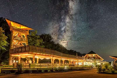 a building under a starry sky at night at Slovenia Eco resort in Stahovica