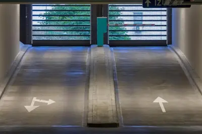 a bowling alley with two arrows on the floor at Slovenia Crib in Ljubljana