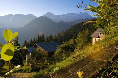 a view of a valley with mountains in the background at Turistična kmetija Perk in Solčava