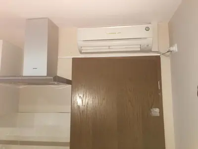a kitchen with a air conditioner on the ceiling at Old part Apartments Banjac in Maribor