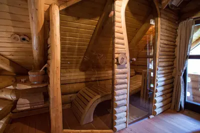 an inside view of a wooden room in a cabin at Village Cottage - Koča na vasi in Nazarje