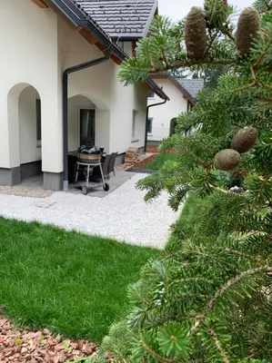 a view of a yard with a house with a desk at Remarkable home Bohinj Lake in Bohinj