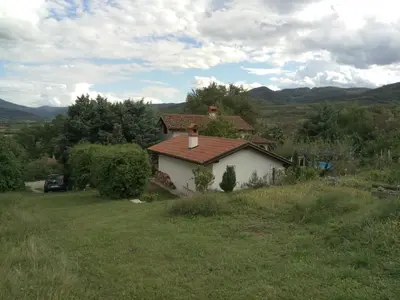 a small house in the middle of a field at Holiday Home Slavi in Vipava