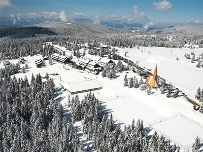 an aerial view of a ski resort in the snow at Zeleni apartma Zreče in Zreče