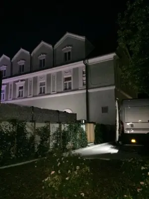 a van parked in front of a building at night at Apartment on Zdraviliski trg 7 in Rogaška Slatina