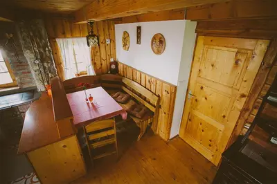 an overhead view of a room with a table and a door at Tourist farm Samec in Sele