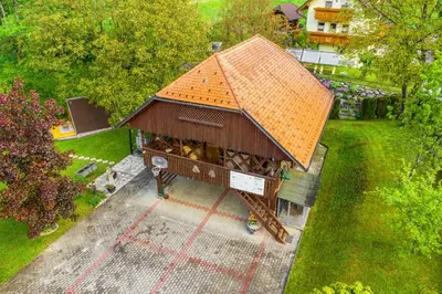 an overhead view of a building with an orange roof at Resort pod orehi - Bled - Apartma & Glamping & Savna in Bled