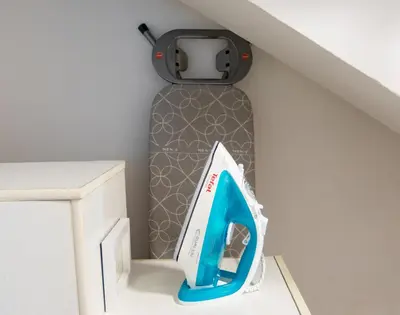 a pizza cutter in a box in a stair case at Emona Guesthouse Ljubljana in Ljubljana