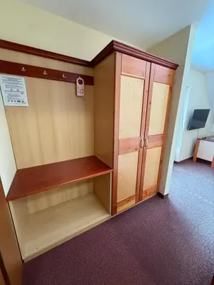 a room with a cupboard and a locker at Guesthouse Jurcek in Zreče