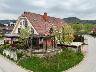 a house on the side of a road at Guesthouse Jurcek in Zreče