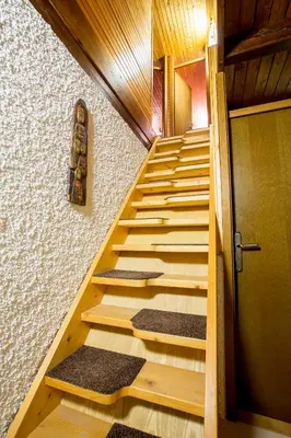 an overhead view of a staircase in a house at Rogla Chalet Urska in Resnik