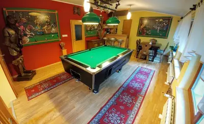 an overhead view of a room with a pool table at Apartments Ina in Rogaška Slatina