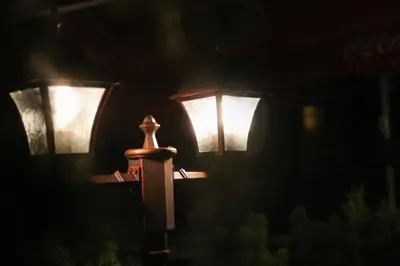 a street light with two lights on it at night at Boutique Hotel Asteria in Ljubljana