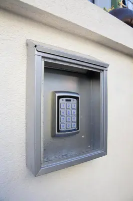 a small television on the side of a building at Apartments SHISHKA in Ljubljana