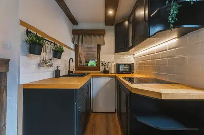 a kitchen with a sink and a counter top at Apartment Trentar in Kranjska Gora