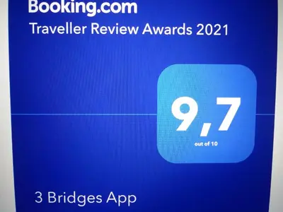 a screenshot of a travel review app on a phone at 3 Bridges App in Ljubljana