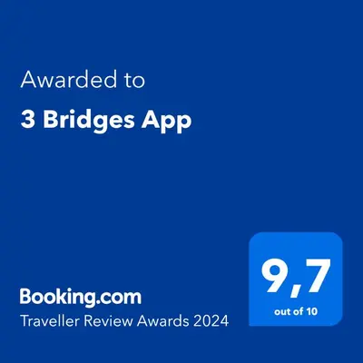 a blue phone screen with the text awarded to bridges app at 3 Bridges App in Ljubljana