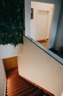 an overhead view of an escalator in a building at Apartments Miki's in Bled