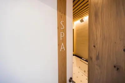 an open door to a room with a stairway at Gostilna Müller in Črnomelj