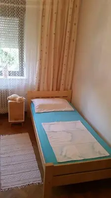 a bedroom with a bunk bed with a window at Apartment Tatjana in Ljubljana
