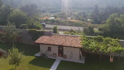 a small house with a view of a highway at Apartment Beks in Postojna