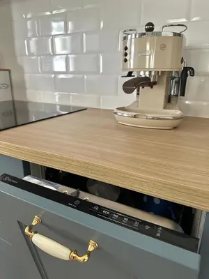 a mixer sitting on top of a counter in a kitchen at Hisa Rejmr with private parking in Kobarid