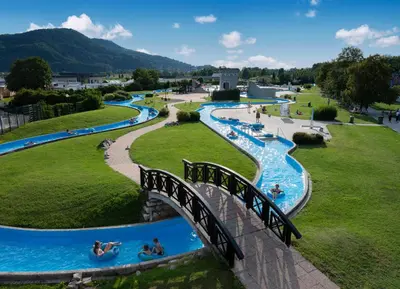 a group of water slides in a park at Terme Village - Mobile Homes in Čatež ob Savi