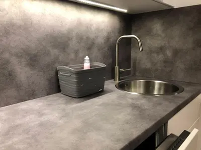 a kitchen with a sink with a soap dispenser on it at Apartments Franc in Bled