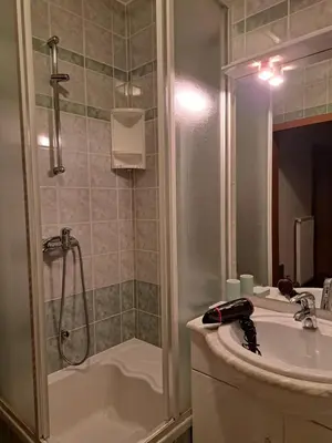 a bathroom with a shower and a sink at Apartma Smole in Kranjska Gora