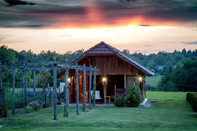 a small cabin in the middle of a field at Holiday Residence Ana in Boršt