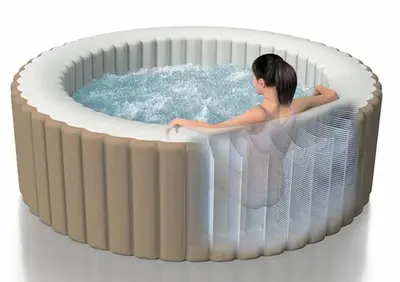 a woman in a bath tub with at Glamping Kolpa Resort in Gradac