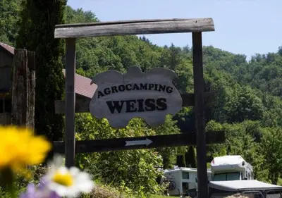 a sign for arex organizing wests in a yard at Turistična kmetija Weiss in Miklavž pri Taboru