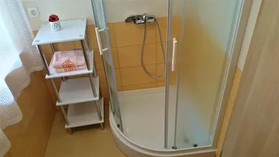 a shower in a bathroom with a glass shower stall at Holiday Home Julian Alps in Bovec