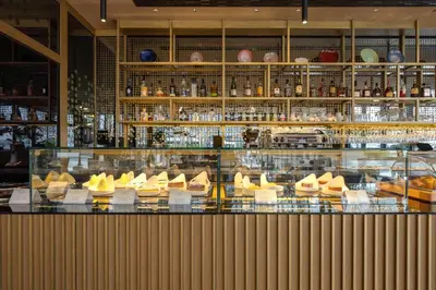 a display case in a restaurant with shoes on display at InterContinental - Ljubljana by IHG in Ljubljana