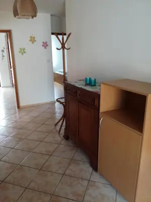 a kitchen with a counter top and a refrigerator at Pri Mlinarju in Tolmin