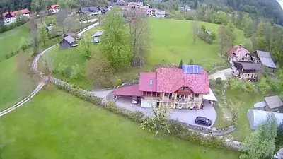 an aerial view of a large house with a red roof at Apartments Bernarda in Bled