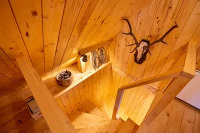 an overhead view of a room with a wooden ceiling at Cosy Lodge Pokljuka in Goreljek