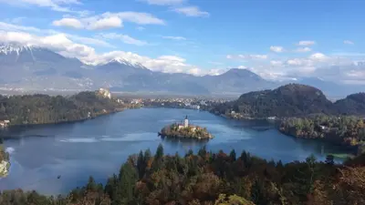 an island in the middle of a large lake at Apartma Gracner in Bled