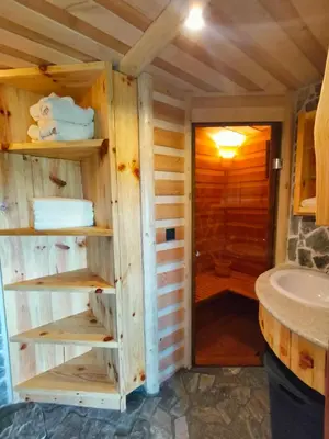 a bathroom with a toilet and a sink at Glamping Lake Bloke in Nova Vas
