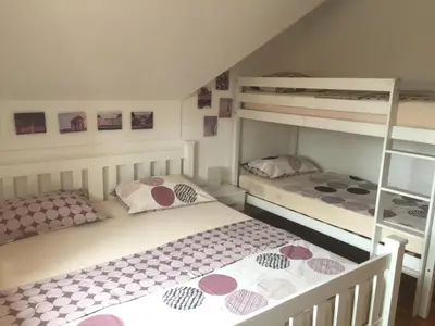 two bunk beds in a small room with at Apartma Jelenček in Moravske Toplice