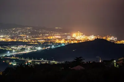 a view of a city at night at Villa EMI in Zgornje Škofije