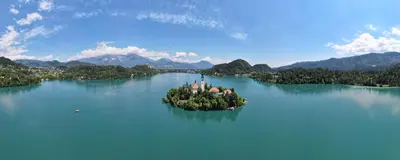 an island in the middle of a large body of water at Vila Lesce with heated outdoor pool in Lesce